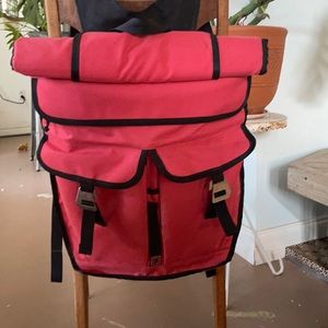Chrome roll top backpack in coral